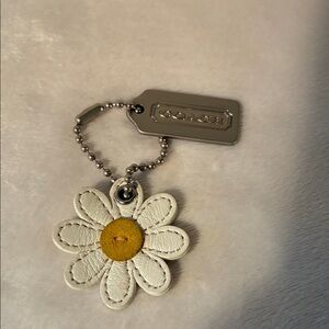 Coach White and Yellow Daisy Keychain. EUC to NWOT. No callouts. hardware=clean
